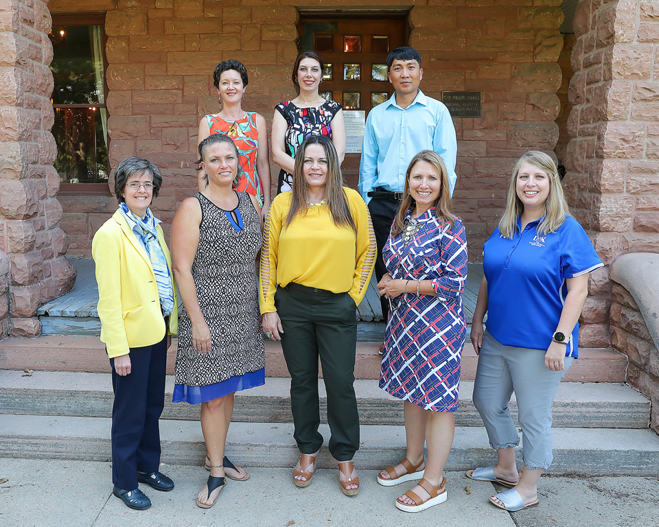 Members of the UNK Online Faculty Research Fellowship program are, front row from left, Dawn Mollenkopf, Shannon Mulhearn, Martonia Gaskill, Marisa Macy and Erin Sweeney and, back row from left, Janet Eckerson, Ladan Ghazi Saidi and Phu Vu. (Photos by Erika Pritchard, UNK Communications)