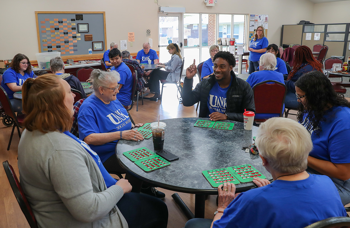 Students from the UNK aging services social work class play bingo with Kearney Manor residents Tuesday morning.