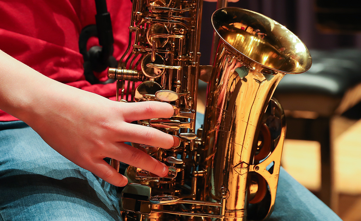 The saxophone designed and built by Jeff Stelling of Kearney features a toggle-key system that allows it to be played with one hand.