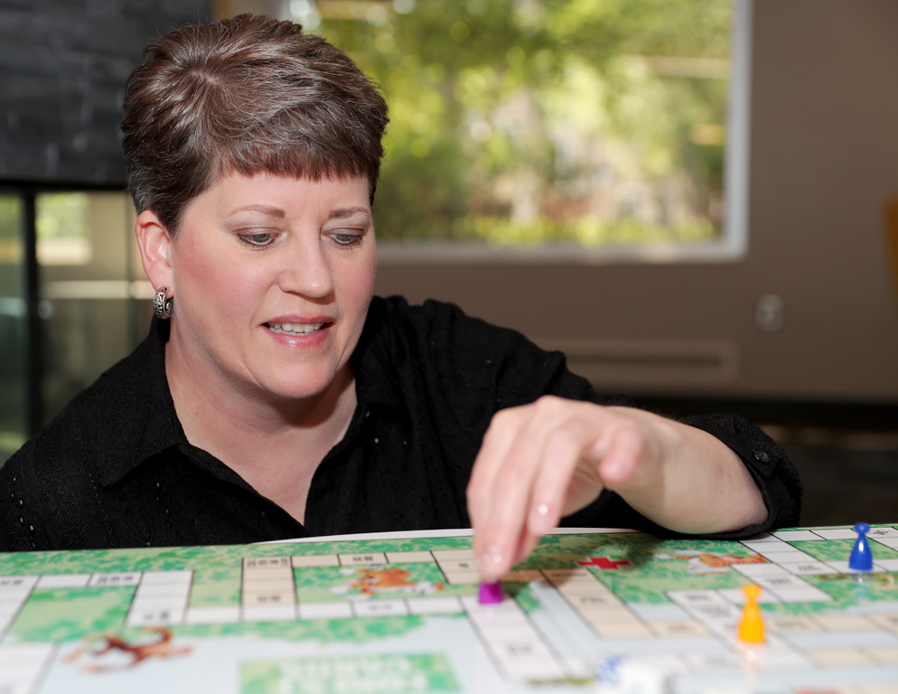 UNK management professor Brooke Envick uses board game design to give her students an experiential learning opportunity that sparks creativity, teaches teamwork and builds confidence. (Photos by Erika Pritchard, UNK Communications)