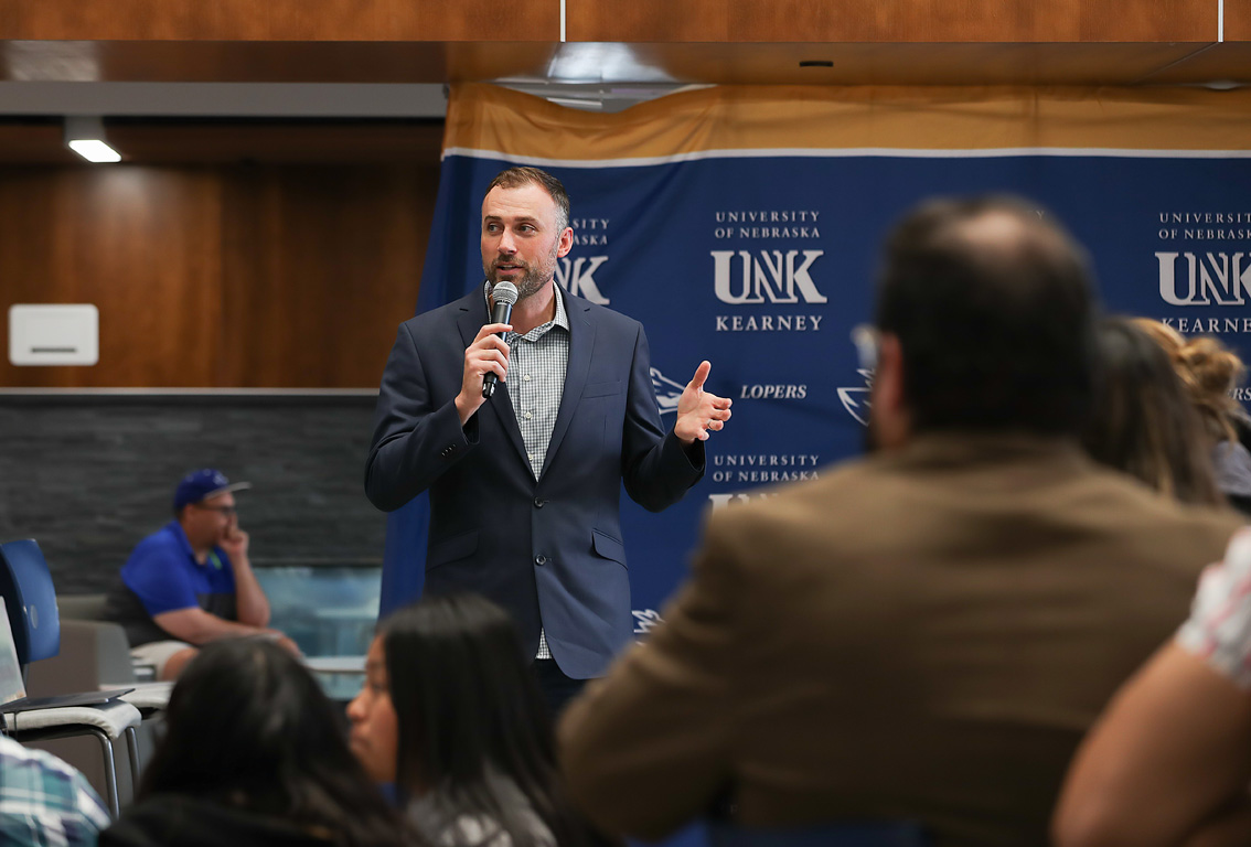 UNK Marketing Director Kyle Means shares his story Wednesday during the annual First-Gen Day celebration on campus.