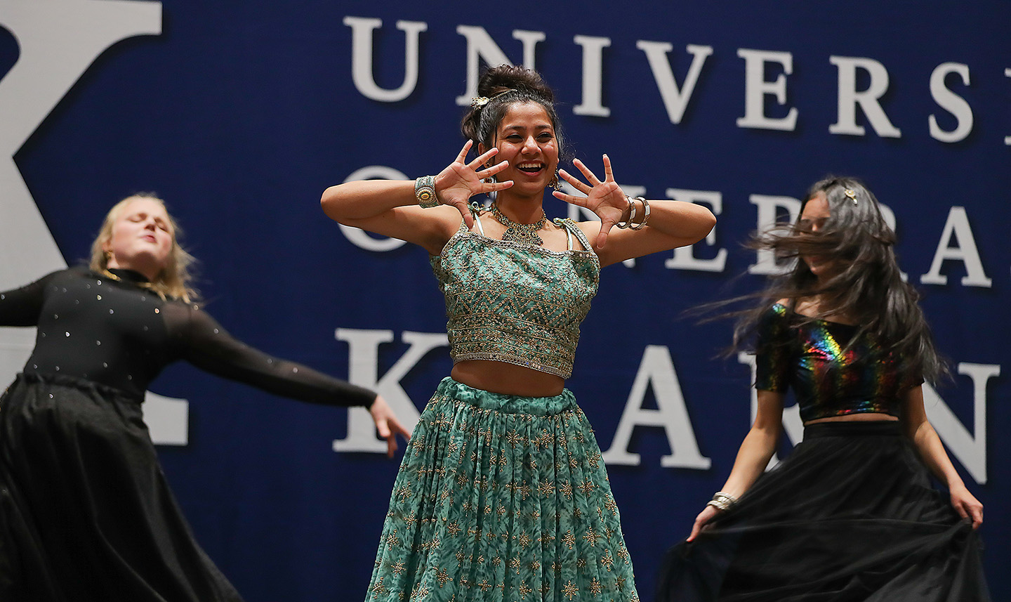 Jashna Samuel, center, performs during last weekend’s Scott D. Morris International Food and Cultural Festival at UNK. Samuel is president of the International Student Association, which hosts the annual event.