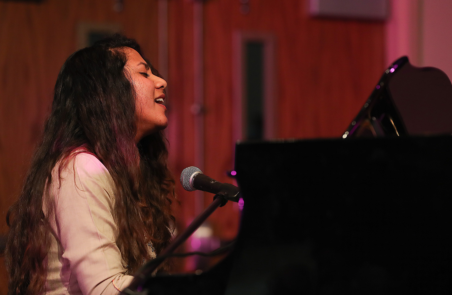 UNK sophomore Jashna Samuel performs during the annual Fame Talent Show on campus. Samuel plays the piano, guitar and drums, and she’s fluent in three languages.