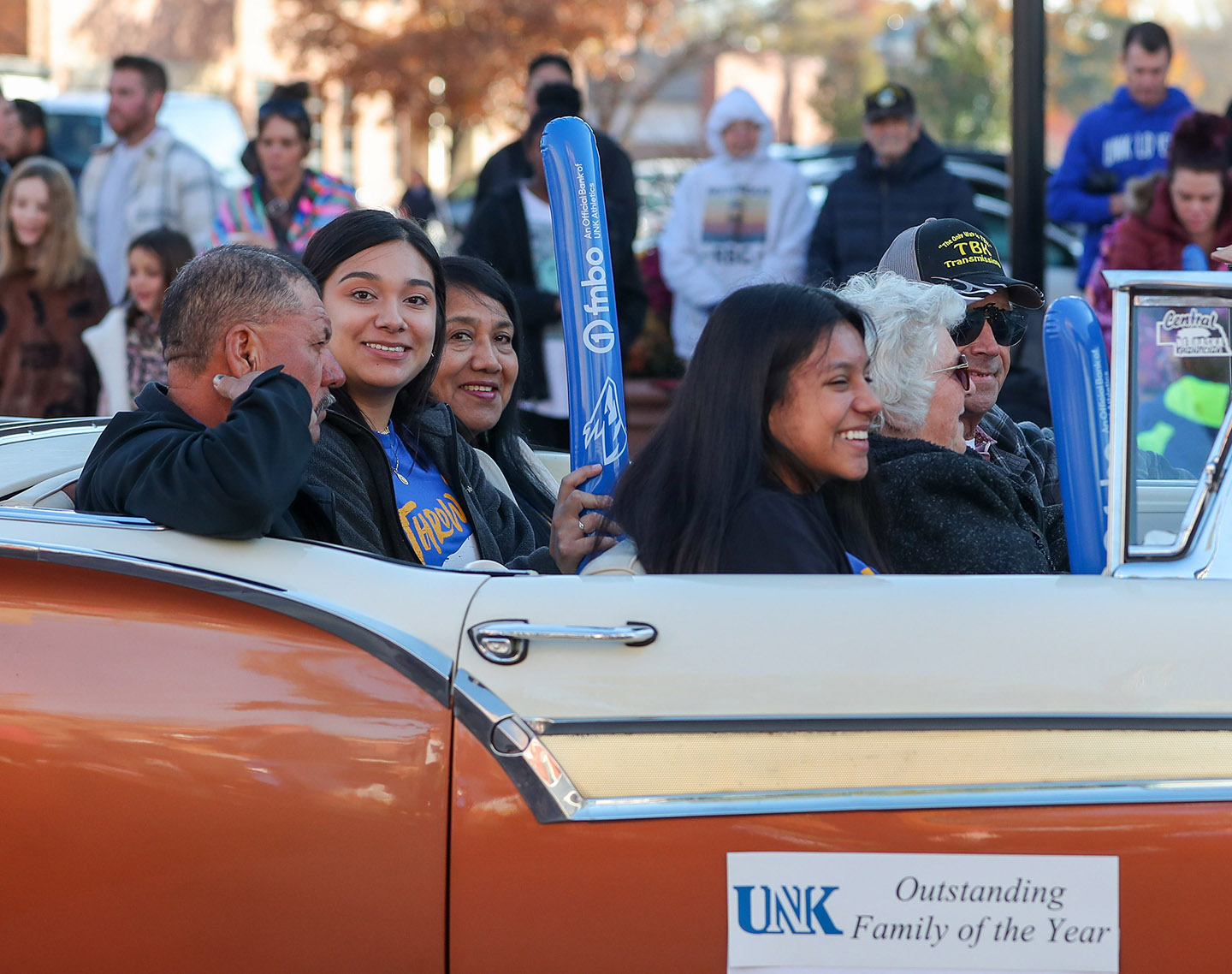 UNK junior Juana Perez is pictured with her parents Lorenzo and Flora and younger sister Jimena during Saturday’s homecoming parade in downtown Kearney. (Photo by Erika Pritchard, UNK Communications)