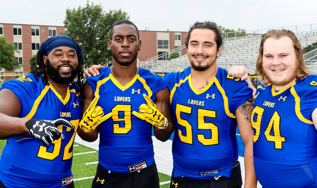 Edwin Hooper, second from left, played two seasons for the UNK football team. (UNK Communications)