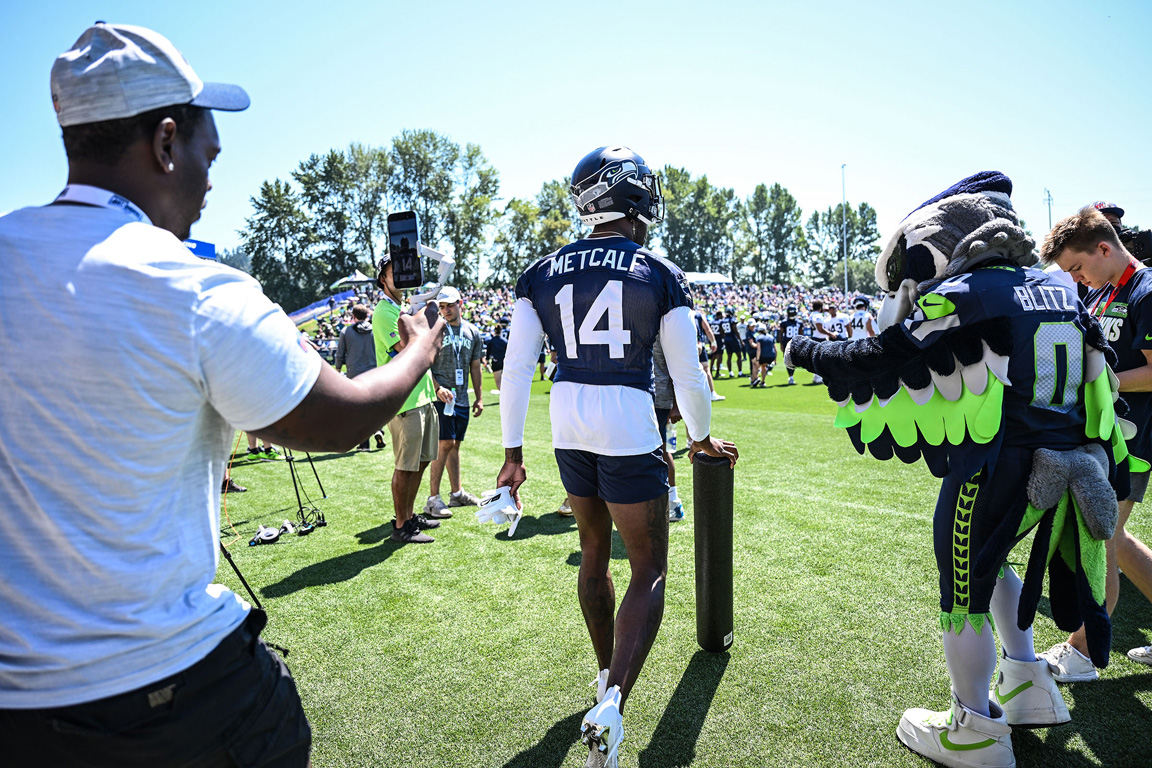 Edwin Hooper, left, creates video content featuring Seattle Seahawks wide receiver DK Metcalf during training camp earlier this year. (Photo by Rod Mar, Seattle Seahawks)