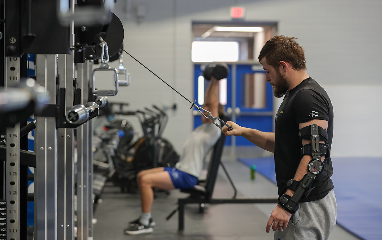 The athletic training room and strength and cardio equipment at UNK’s new Ron and Pam Blessing Wrestling Facility allow athletes to remain with their teammates while undergoing treatment or rehab following an injury.