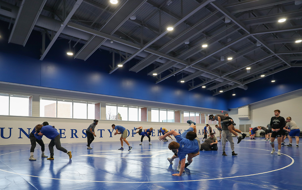 Members of the UNK wrestling team are pictured during a recent practice inside the new Ron and Pam Blessing Wrestling Facility. Located on the main level of the Health and Sports Center/Cushing Coliseum, the nearly 10,000-square-foot wrestling facility opened late last month. (Photos by Erika Pritchard, UNK Communications)