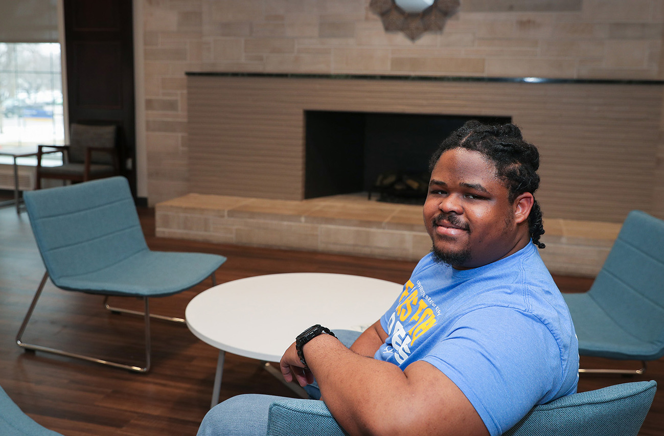 UNK sophomore Shawn Peterson is pictured inside Martin Hall, the new fraternity housing where he serves as a resident assistant. (Photo by Erika Pritchard, UNK Communications)