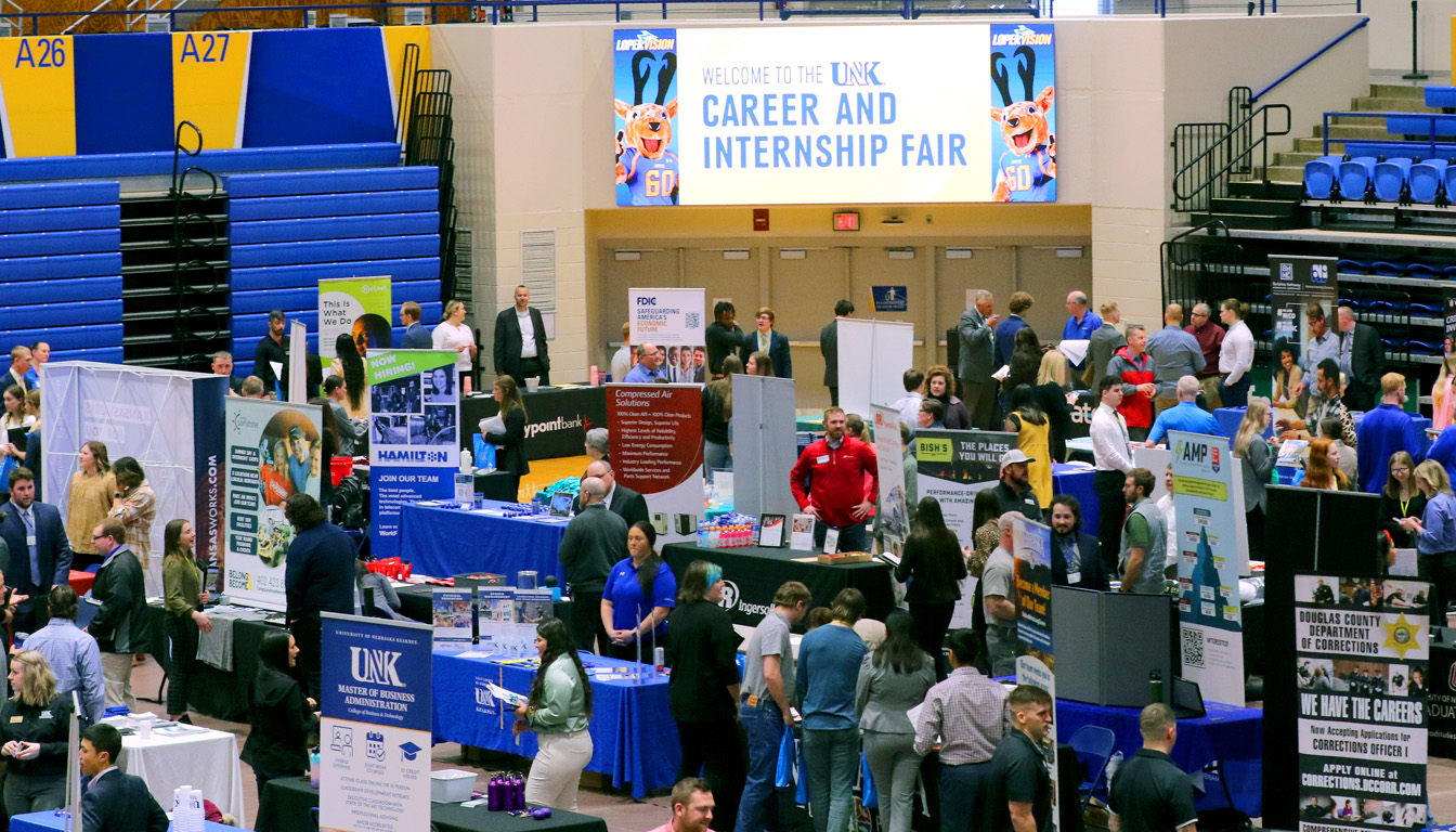 UNK students and employers from across the region fill the Health and Sports Center arena during Thursday's Career and Internship Fair.