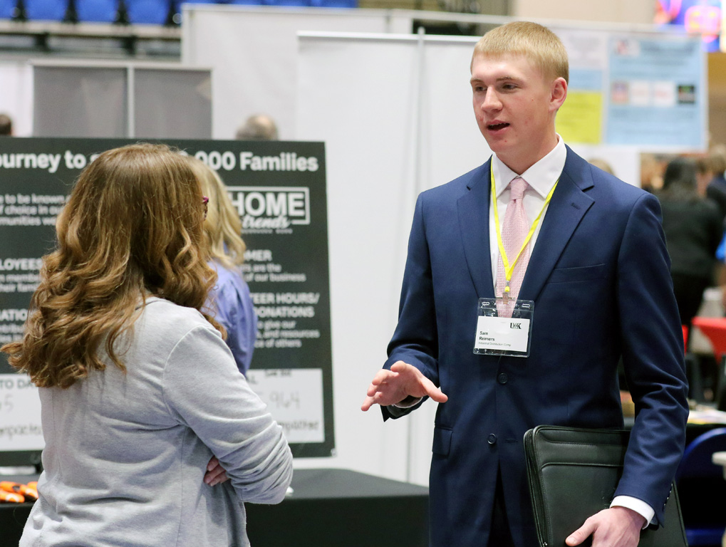 UNK sophomore Sam Reimers meets with an employer during Thursday’s Career and Internship Fair at the Health and Sports Center on campus. (Photos by Todd Gottula, UNK Communications)