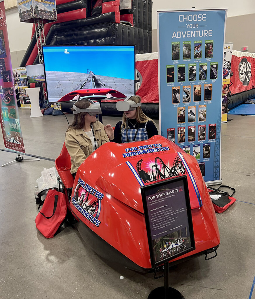 A virtual reality roller coaster on display at the NACA convention.