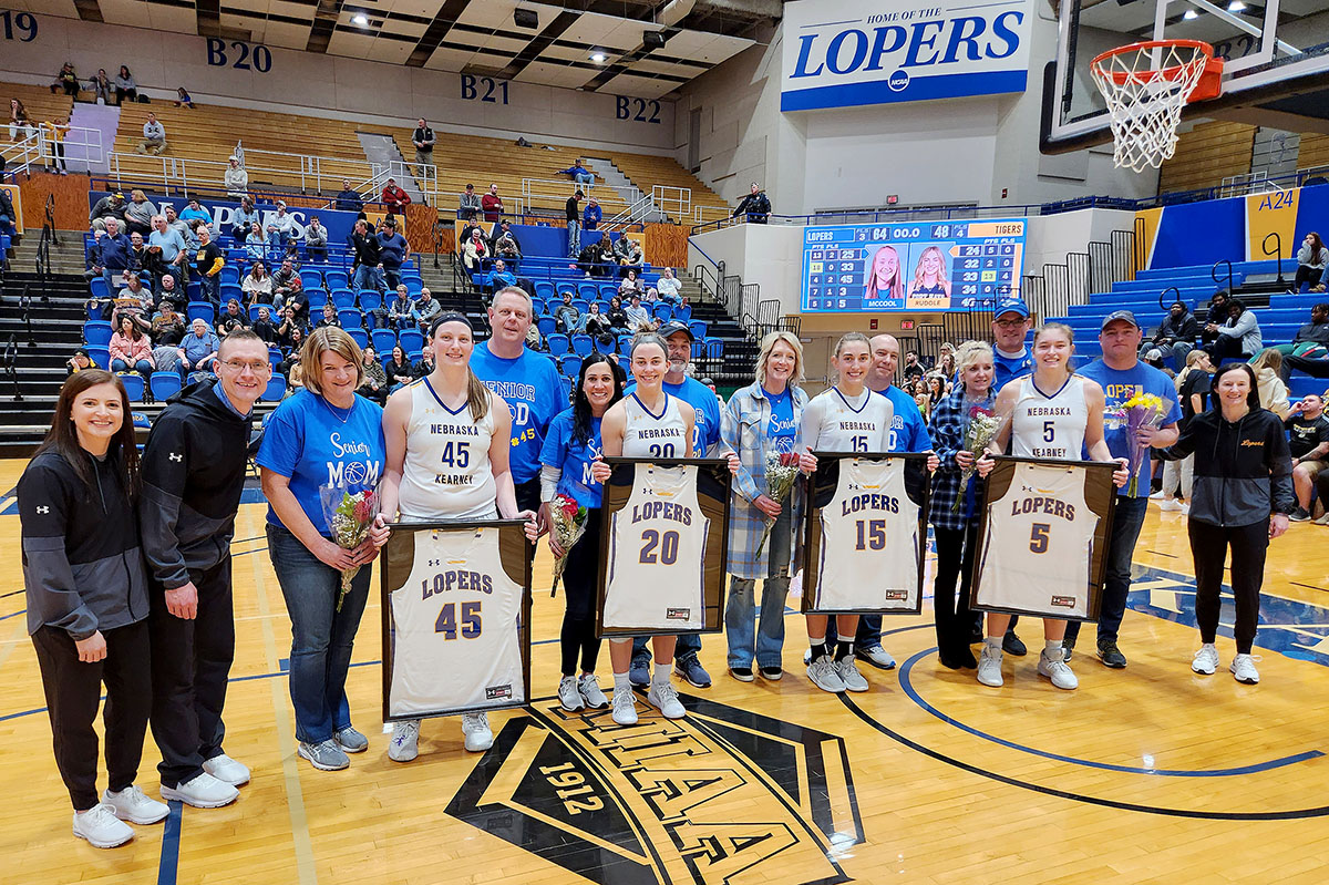 From left, Brooke Carlson, Klaire Kirsch, Maegan Holt and Elisa Backes were recognized Feb. 25 on Senior Day for the UNK women’s basketball team.