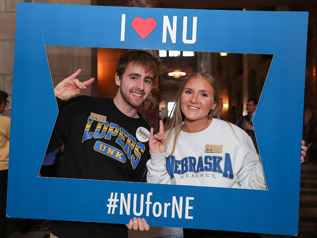 UNK students Luke Sykes and Allie Daro pose for a photo Wednesday during “I Love NU” Day.