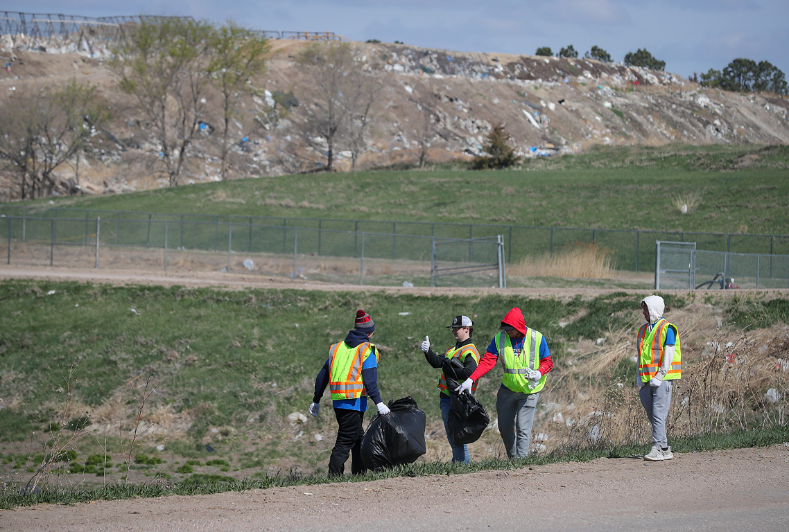 Members of UNK’s Sigma Tau Gamma fraternity pick up trash at the Kearney landfill during The Big Event. Nearly 600 Lopers participated in community service projects across the city on Saturday.