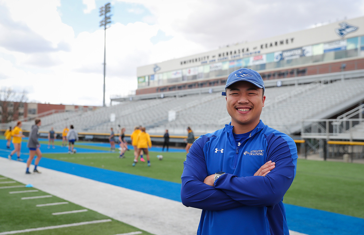 UNK graduate student Kobe Lo decided to pursue a career in athletic training because it combines his love of sports with his desire to help others. He’ll complete his master’s degree this summer and he already has a full-time position lined up as the athletic trainer at Lexington High School. (Photos by Erika Pritchard, UNK Communications)