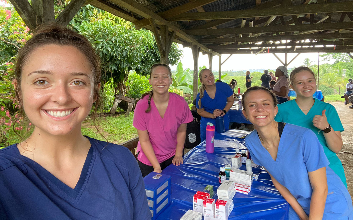 UNK students volunteer at a mobile medical clinic in Bocas del Toro, Panama, as part of a medical outreach program. (Courtesy photos)