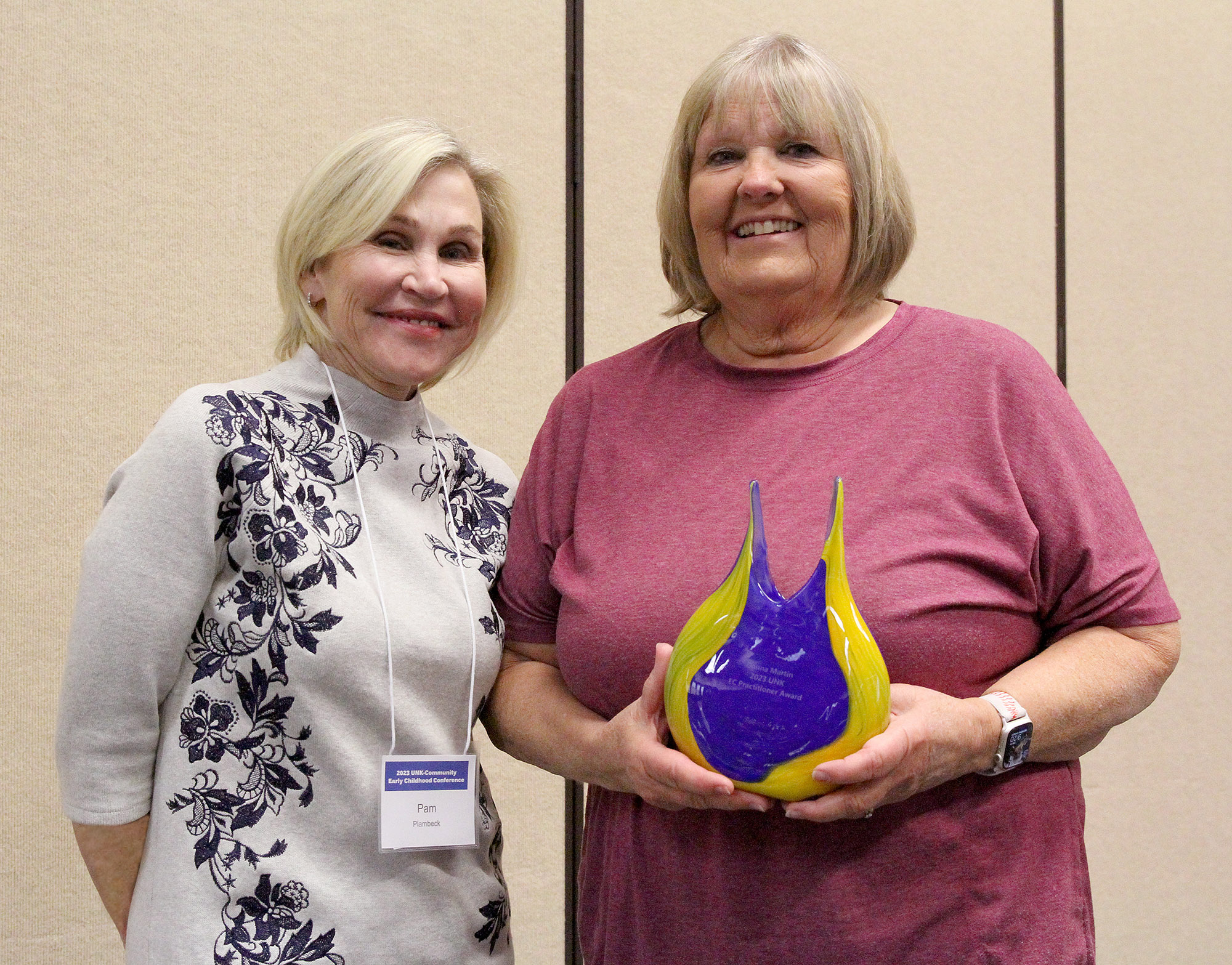 Donna Martin, a Montessori teacher from Omaha, right, was recognized with the Early Childhood Practitioner Award during Friday’s UNK-Community Early Childhood Conference. She’s pictured with Pam Plambeck, daughter of the late LaVonne Plambeck.