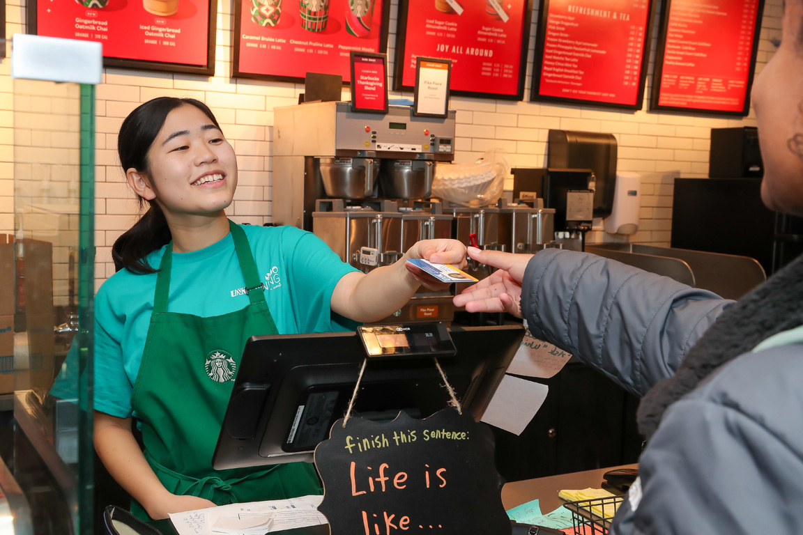 Erika Tsuji enjoys her job at Starbucks inside the UNK student union.