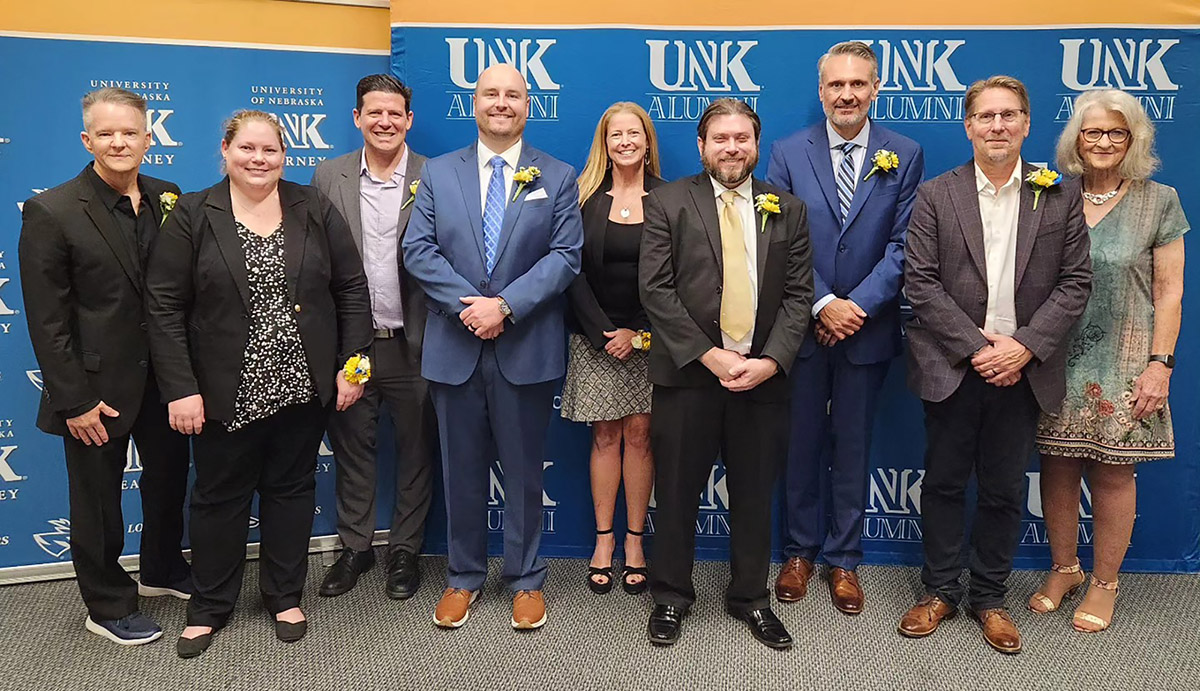 Tim Schlattmann, left, and several other UNK graduates were recognized by the UNK Alumni Association during this year’s homecoming festivities. Schlattmann received the Distinguished Alumni Award and spoke to current students when he was back on campus. (UNK Alumni Association)