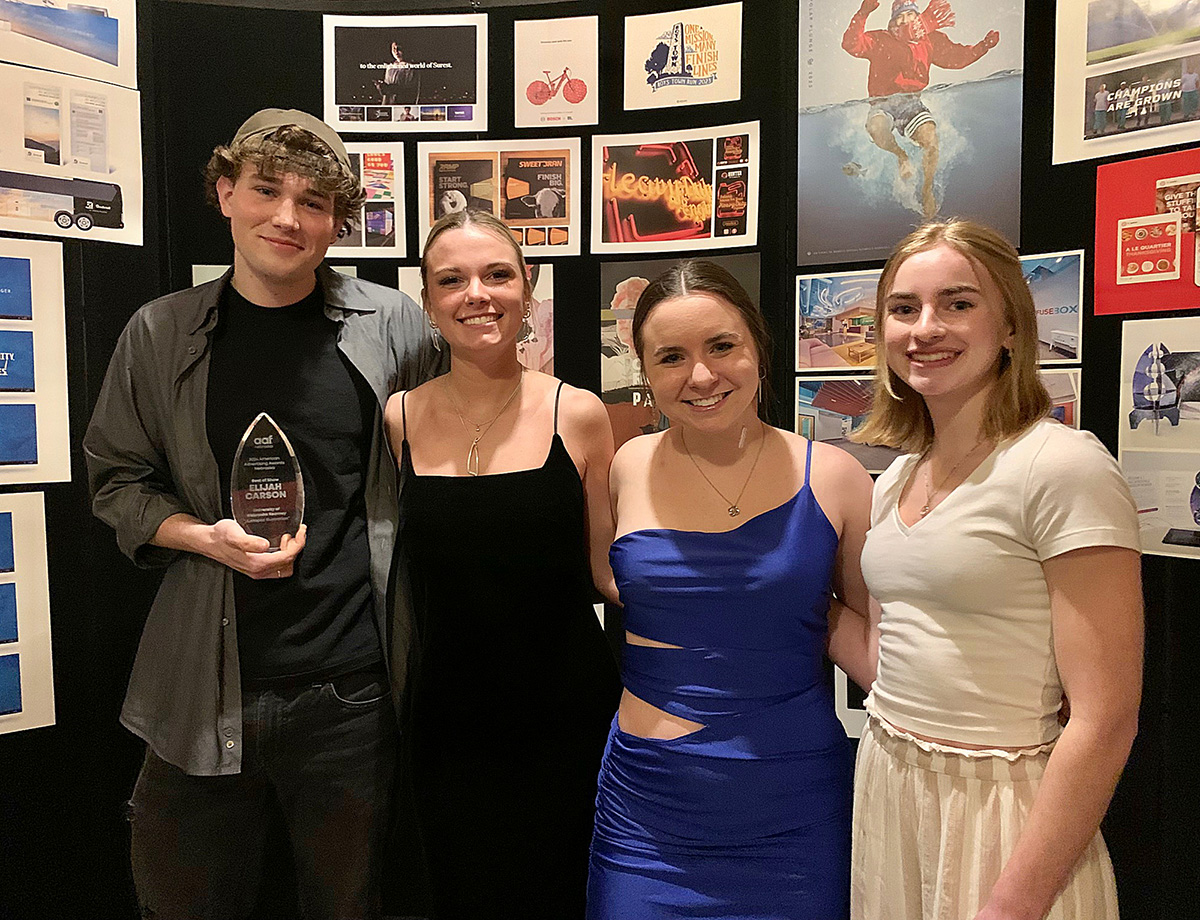 From left, UNK students Elijah Carson, Rilynn Lutt, Abigail Heins and Tia Broadwell are pictured during the Nebraska American Advertising Awards competition in Lincoln. (Courtesy photo)