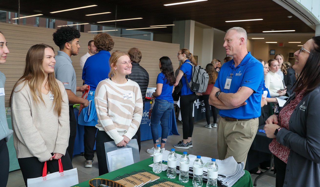 Robert Dyer, CEO of Cozad Community Health System, meets with health science students Tuesday during the Hospital Partners Networking Event at UNK. (Photos by Erika Pritchard, UNK Communications)
