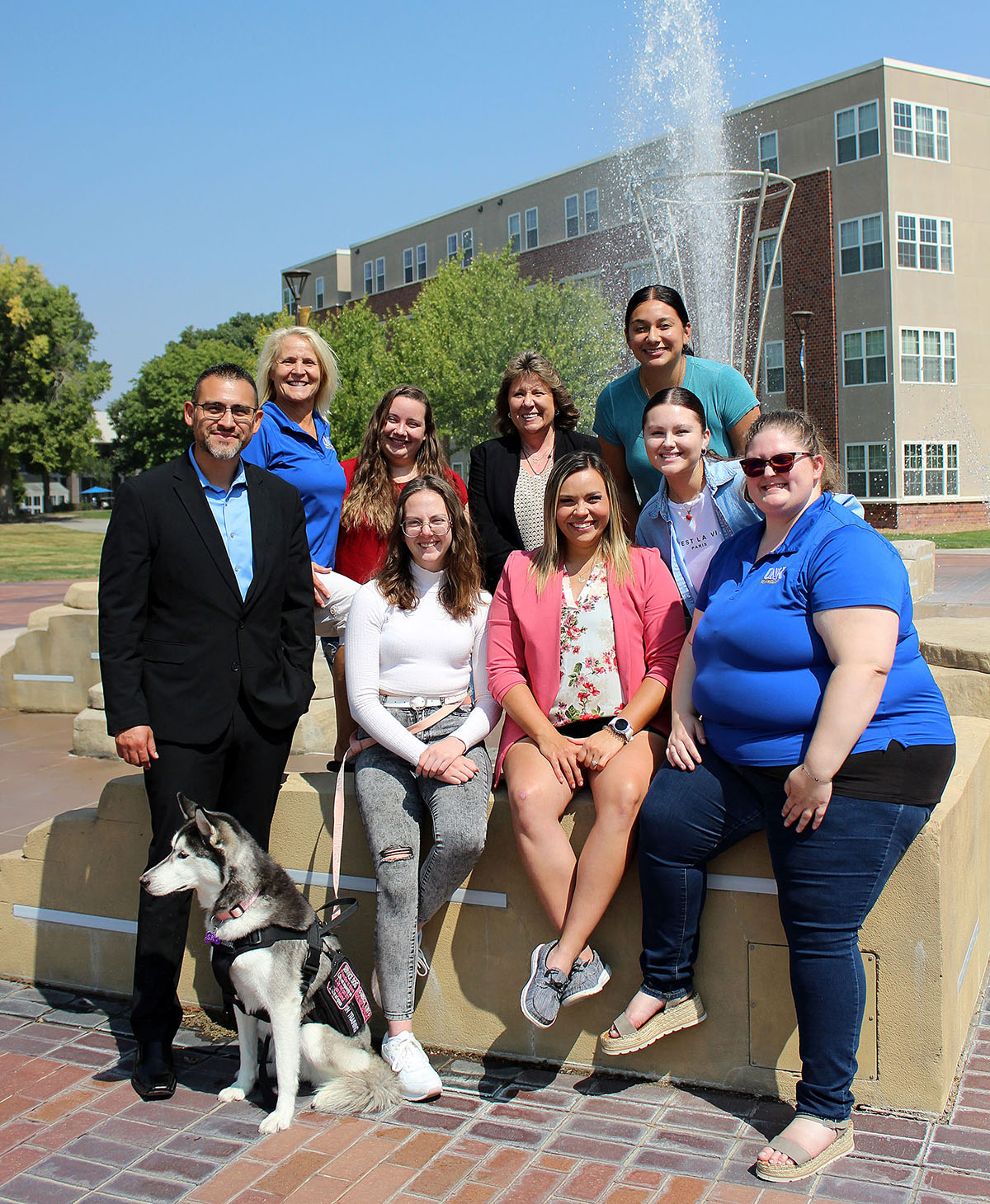 Members of the Behavioral Health Opportunities Program (BHOP) are pictured on the UNK campus. Front row from left, Roger Garcia, associate director of recruitment and retention for the Behavioral Health Education Center of Nebraska (BHECN) at UNMC; UNK students Olivia Longmore, Mariah Seim and Haley Clark; and Marly Brenning, the BHOP coordinator at UNK. Back row from left, Krista Fritson, a psychology professor and director of the BHECN site at UNK; and UNK students Johanna McClure, Robyn Springer and Juana Perez. (Photo courtesy of BHECN)