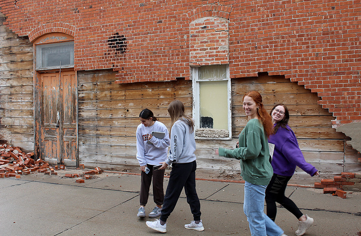 Students in the UNK interior and product design program visit the Marcellus Building in downtown Franklin earlier this year. They’re working with community officials and the South Central Economic Development District on a project that would turn the historic property into affordable housing. (Courtesy photo)