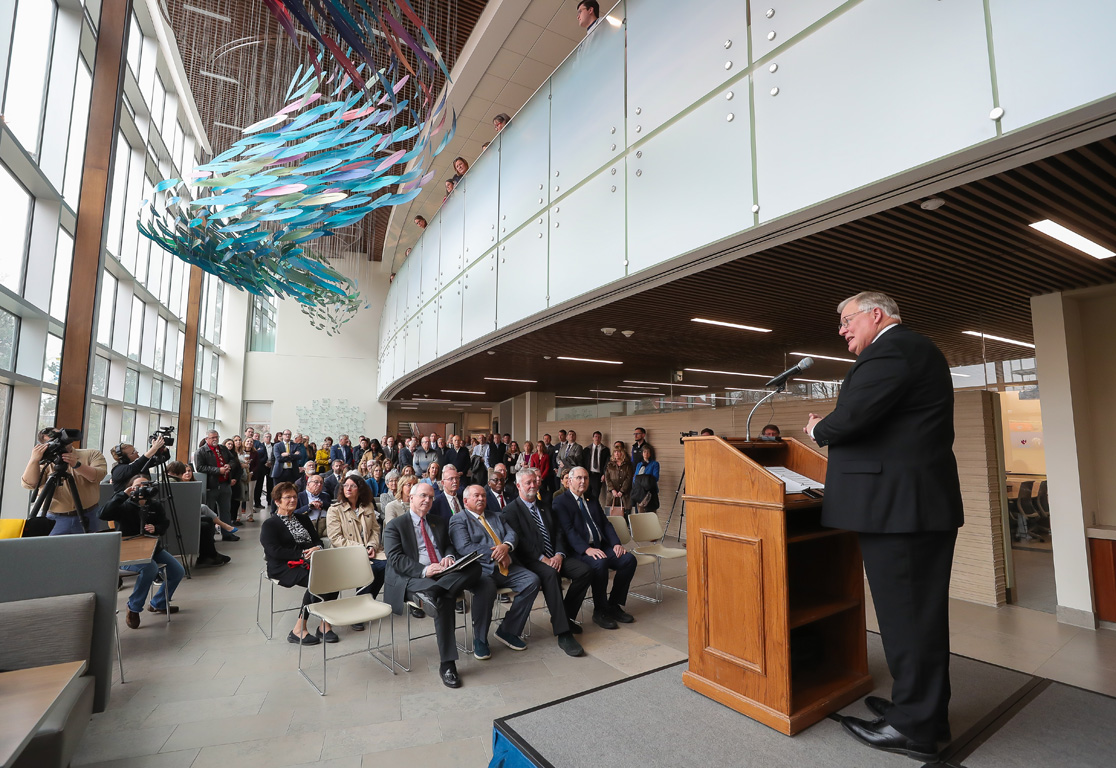 UNK Chancellor Doug Kristensen addresses the crowd Monday morning during a beam-raising ceremony for the new Rural Health Education Building on campus.