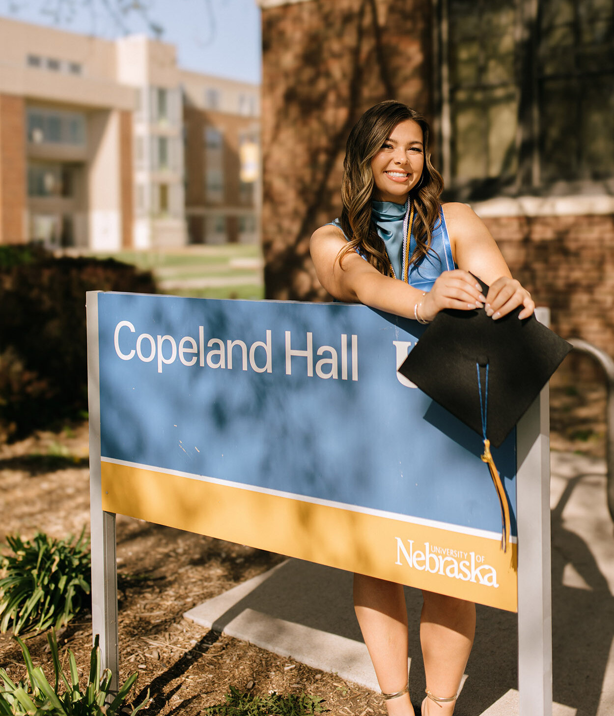 Katie Cornelio graduates from UNK on Friday with a bachelor’s degree in social science education. She was also selected to speak at the commencement ceremony. (Cheyanne M. Photography)