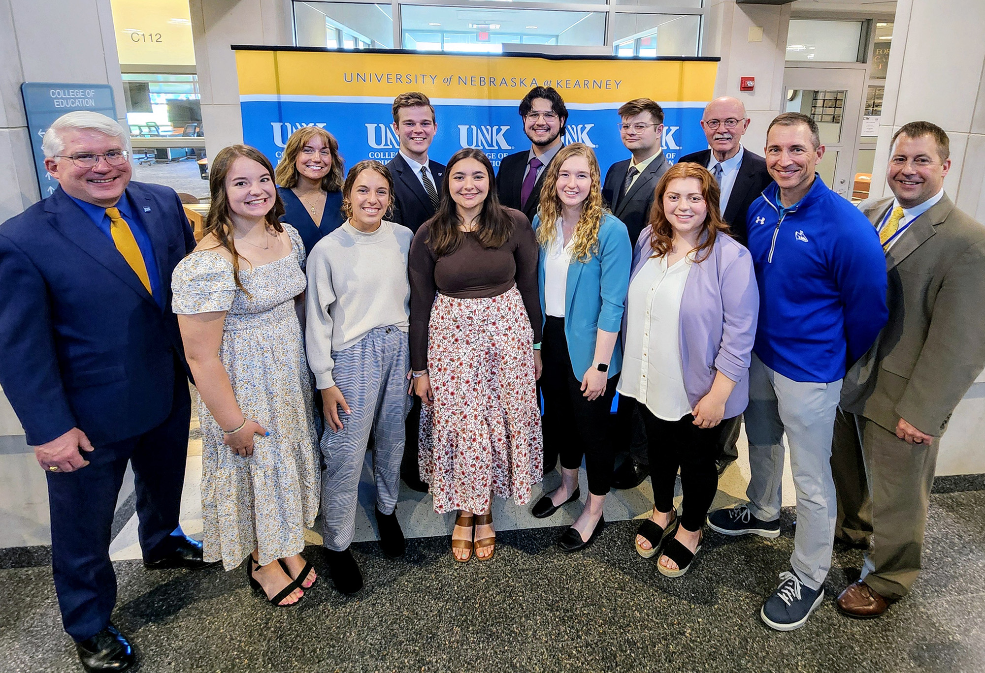 Nine UNK and Kearney High School students received the inaugural Kearney Teachers Tomorrow scholarships. They were recognized Friday during a signing ceremony at UNK's College of Education building.