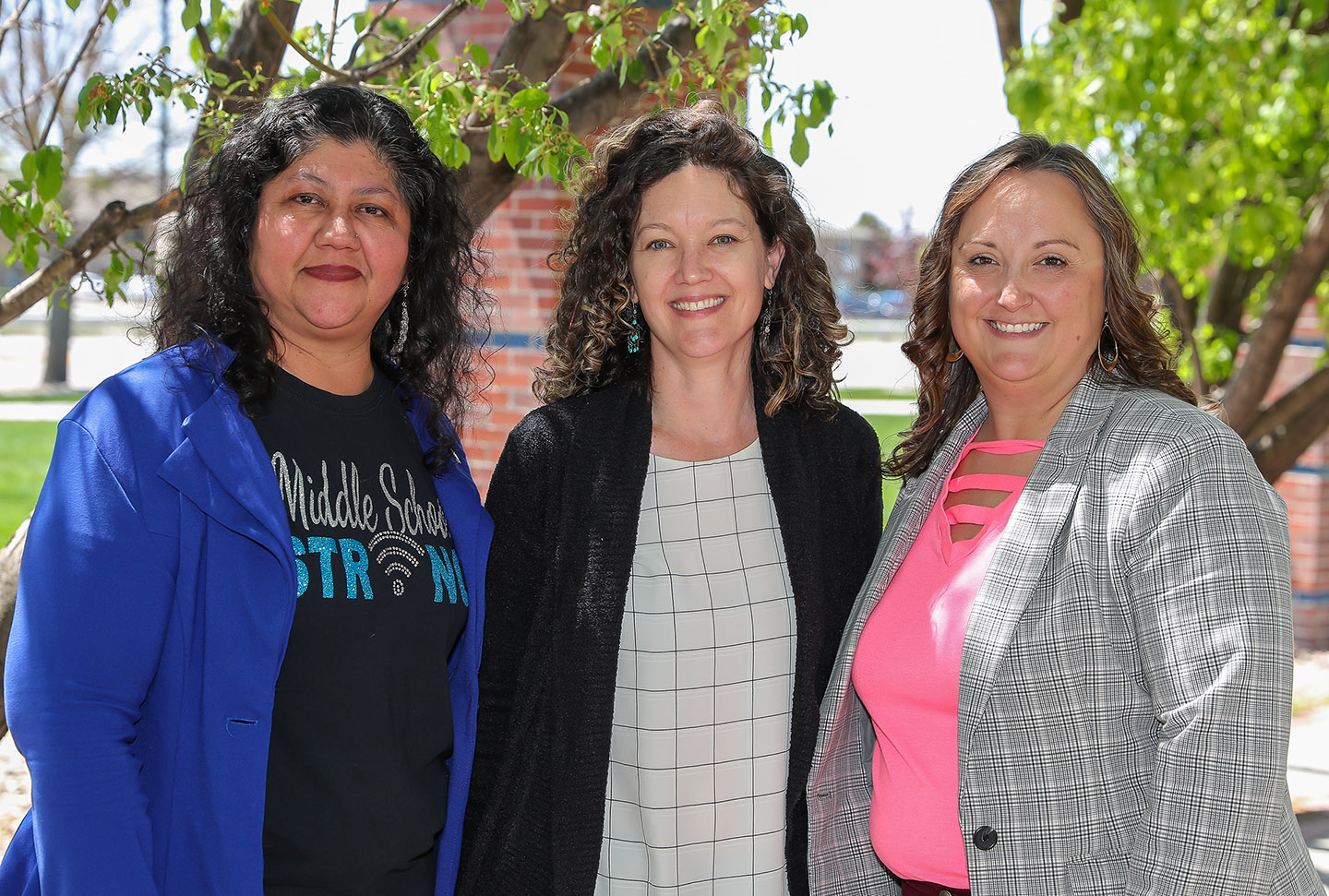 From left, UNK faculty members Chandra Diaz, Janet Eckerson and Chelsea Feusner are working with Educational Service Unit 10 on a project that addresses the ongoing teacher shortage in Nebraska. Aprille Phillips is also part of the UNK team.