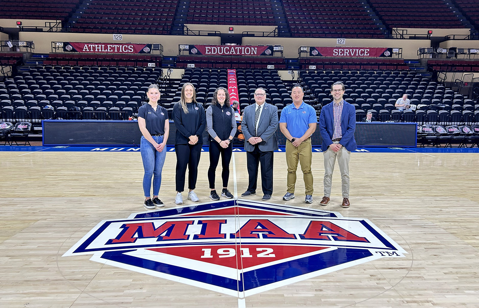 UNK graduate Haley Schall, left, recently completed a six-month internship with the MIAA. (Courtesy photo)