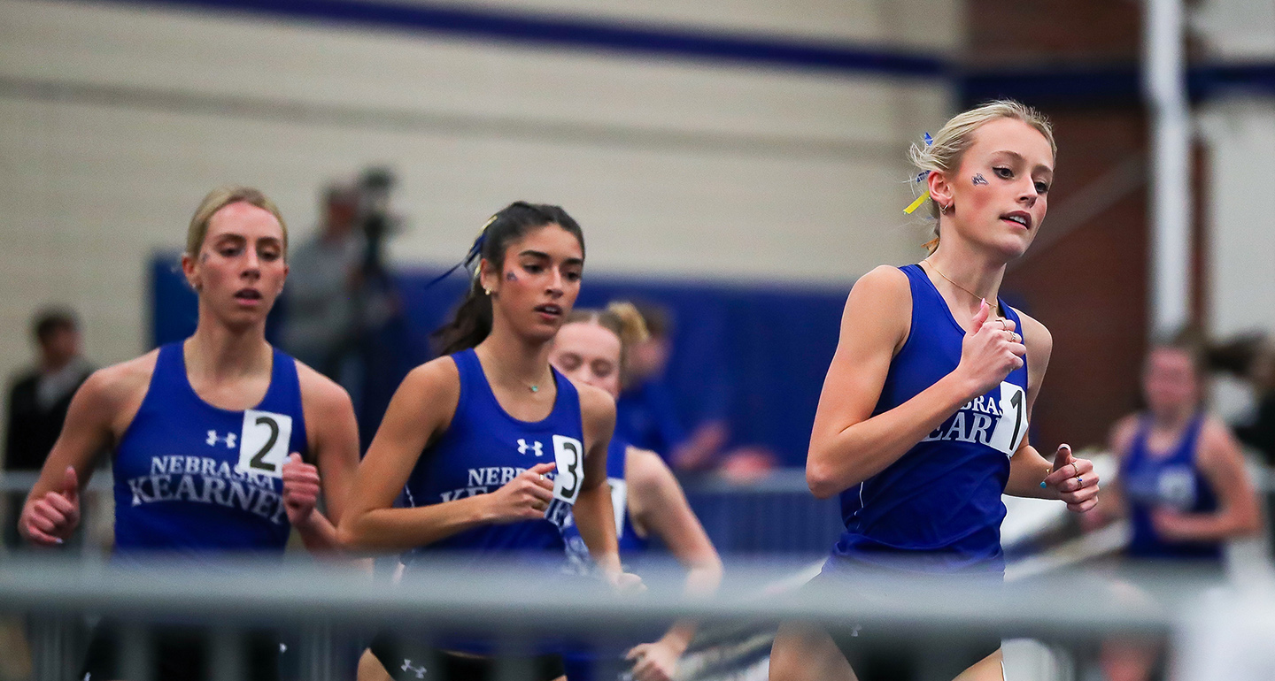 Mara Hemmer, right, competes on the UNK cross country and track and field teams.