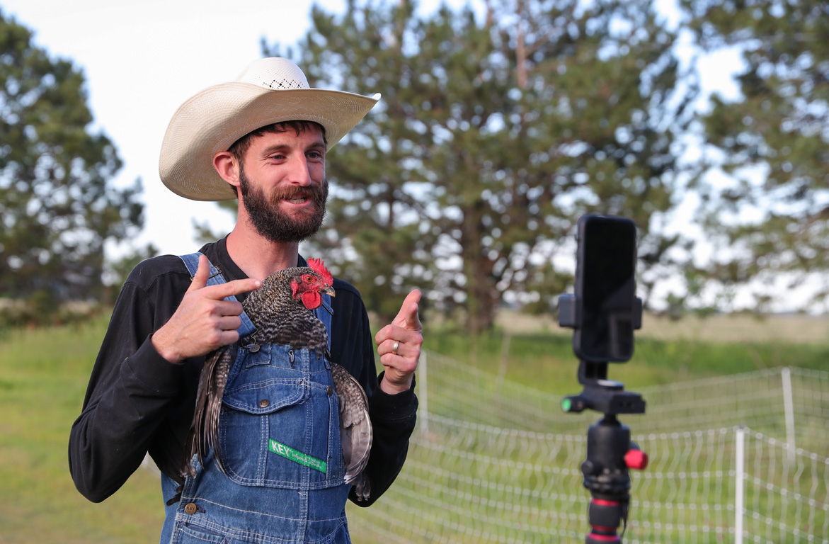 UNK graduate Noah Young uses his Shiloh Farm social media accounts to share information about agriculture and food production.