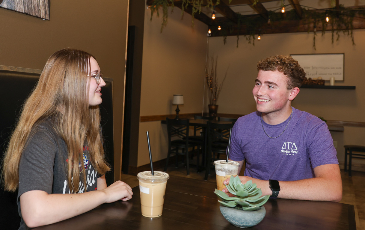 UNK health science students Alexys Hurt and Brodie Mitchell hang out at Beans and Steams Coffee House in Sidney while participating in the Rural Immersion Program. (Photos by Erika Pritchard, UNK Communications)