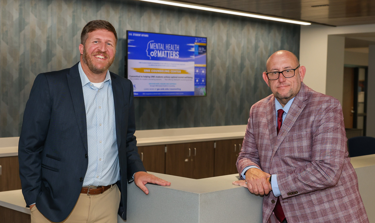 Aaron Estes, left, and George Holman pose for a photo inside the new Loper Success Hub at UNK. Located on the second floor of Calvin T. Ryan Library, the Success Hub centralizes academic resources on campus, creating a student-focused environment that’s dedicated to learning, belonging, development and support. (Photos by Erika Pritchard, UNK Communications)