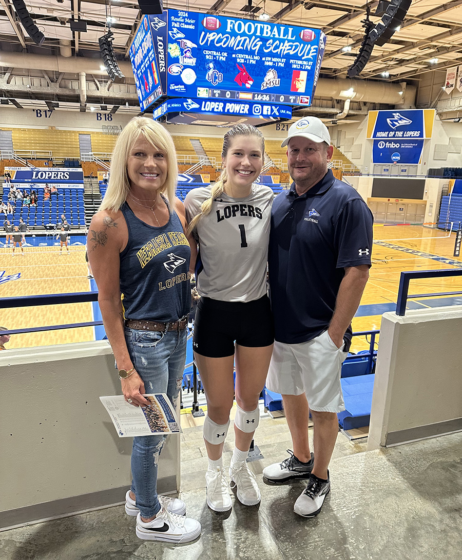 Peyton Neff is pictured with her mother, Pam (Sis) Jorgensen, and father, P.D. Neff. Pam and P.D. were both Loper student-athletes.