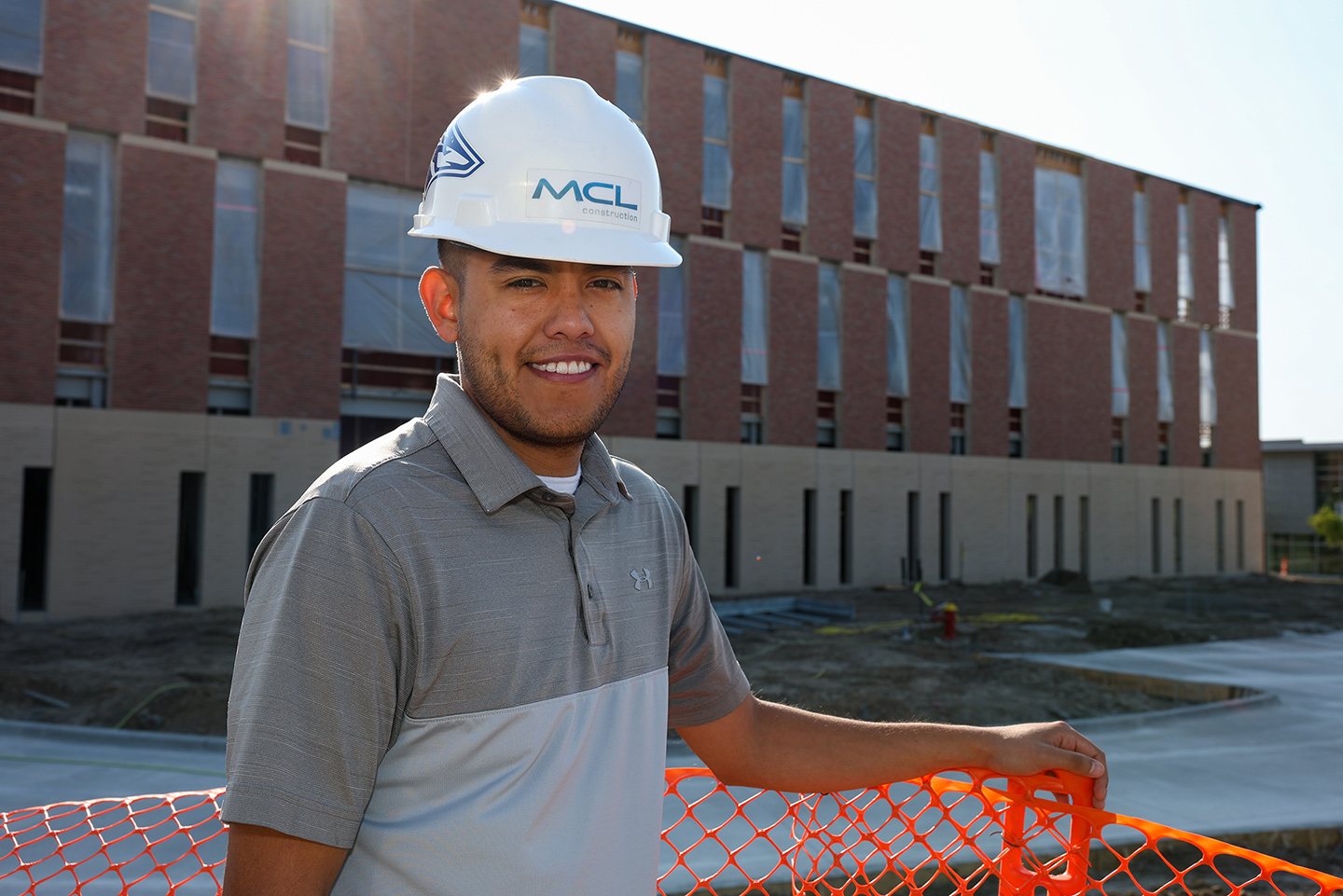 UNK graduate David Almanza is a project manager with MCL Construction. He’s part of the team building the $95 million Rural Health Education Building on campus. (Photos by Erika Pritchard, UNK Communications)