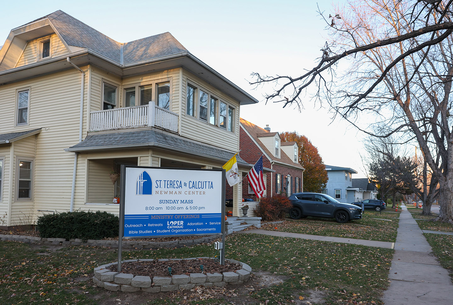 The Catholic Newman Center currently operates out of residential buildings on five properties in the 800 block of West 27th Street, just east of the UNK campus. A proposed land swap agreement transfers those properties to UNK, which would use them to expand residential parking for students. (Photos by Erika Pritchard, UNK Communications)