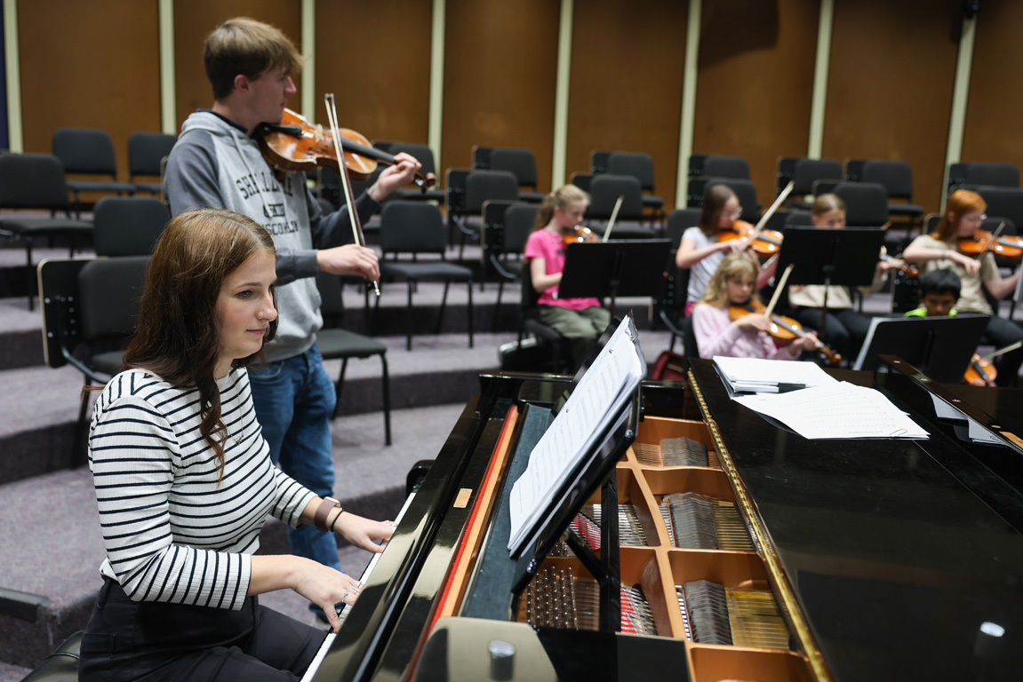 UNK students Abbygail Marshall and Noah Reimer lead a UNK String Project class in the Fine Arts Building on campus. The program provides high-quality, low-cost music instruction for Kearney-area youths. (Photos by Erika Pritchard, UNK Communications)