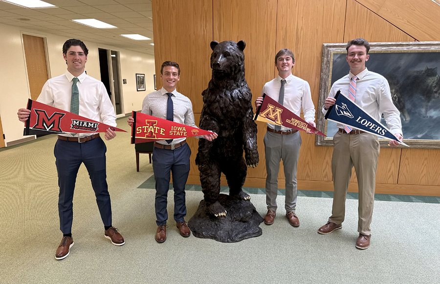 UNK senior Caleb Hoadley, right, is pictured with the other summer interns at Uline, where he worked as a sales representative. (Courtesy photo)