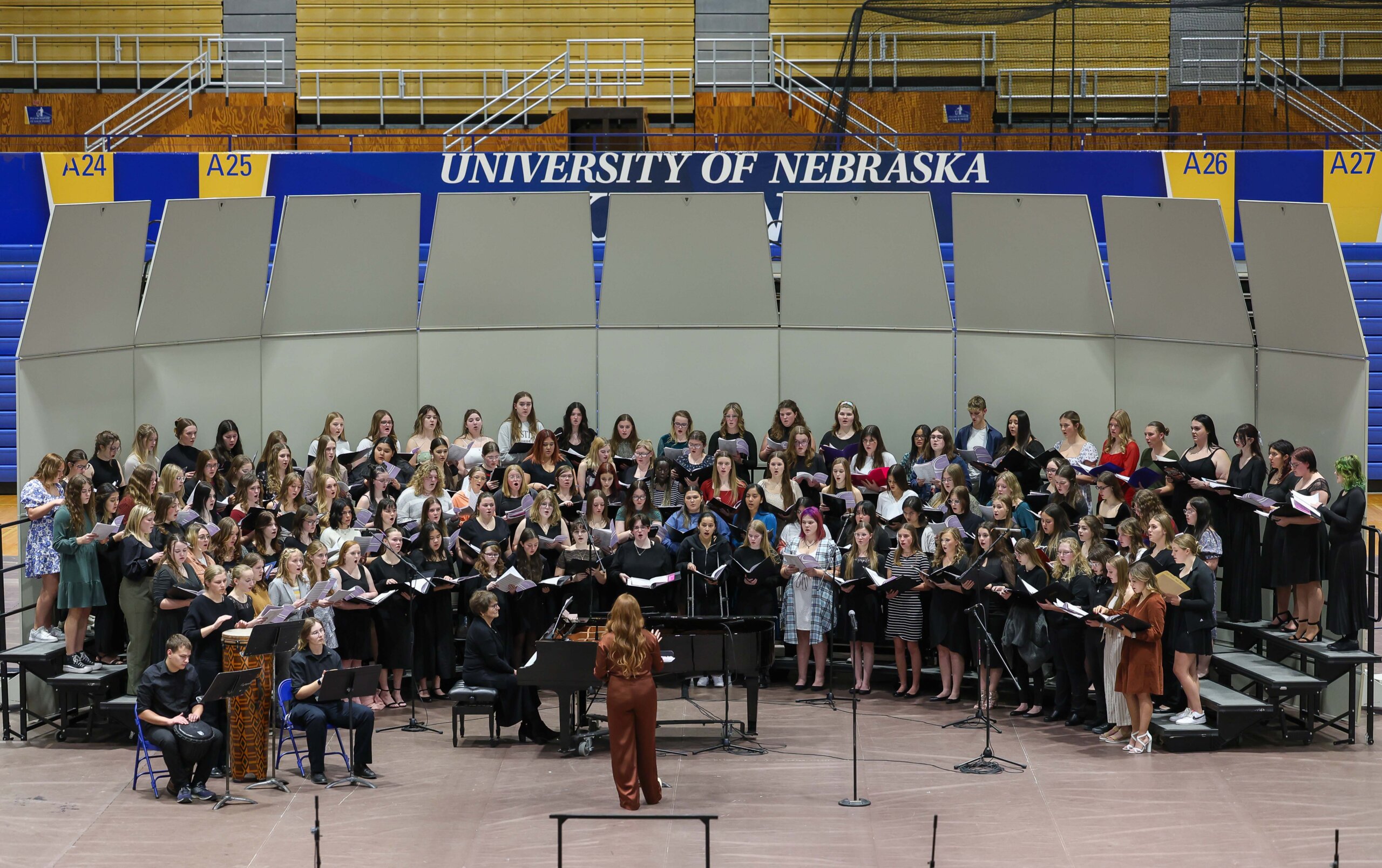 High school students sing at a choral concert at UNK.