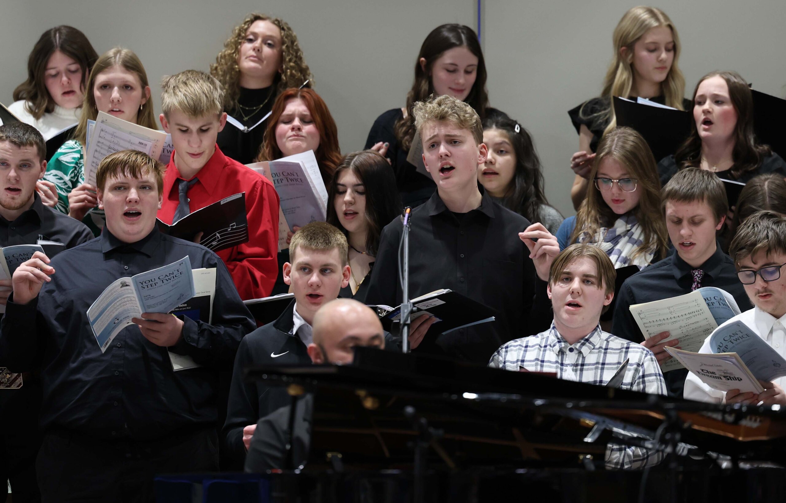 High school students sing at a choral concert at UNK.