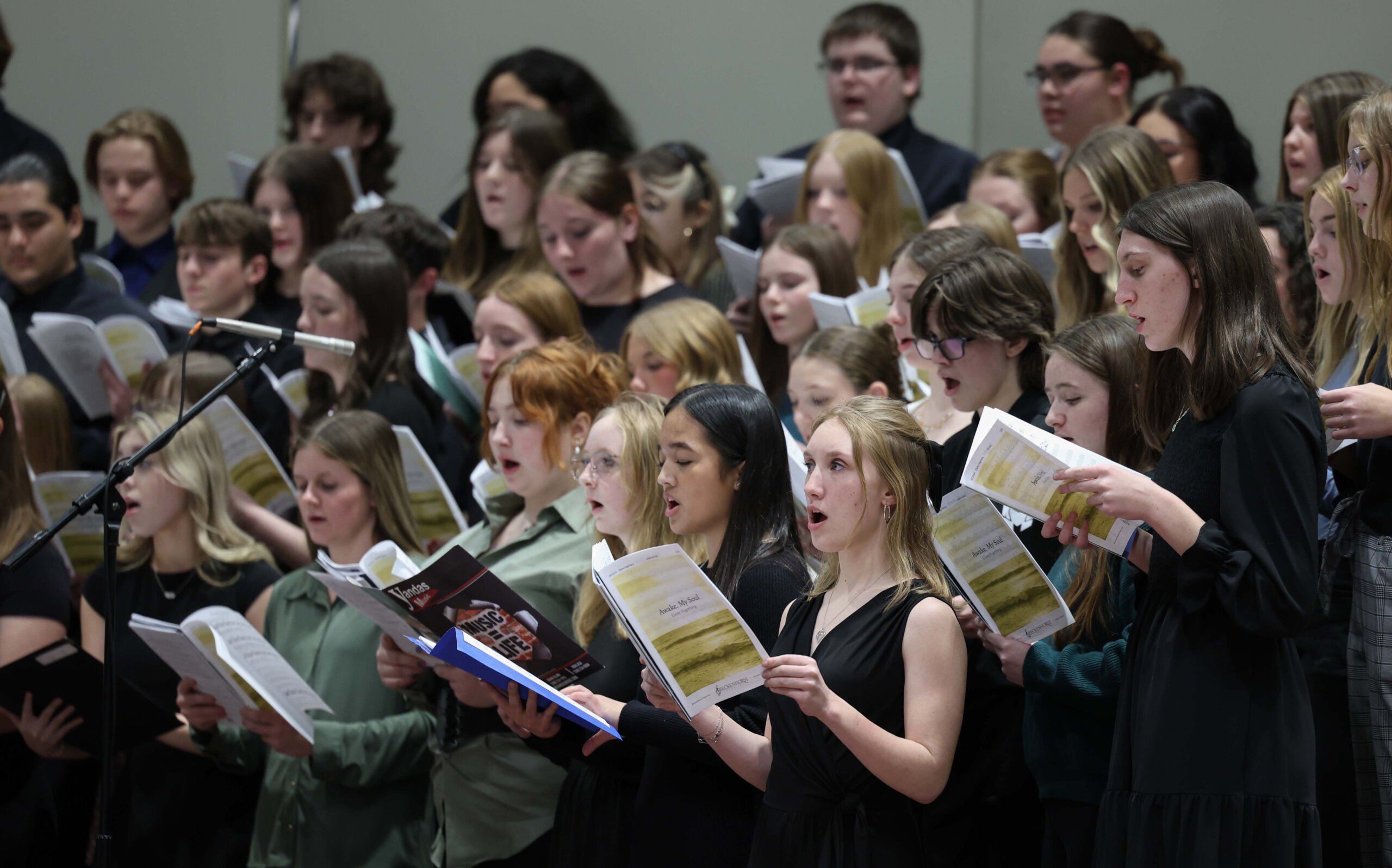 High school students sing at a choral concert at UNK.