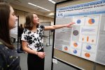 Lindsey Smith, a junior at the University of Nebraska at Kearney, shares the results of her study on club volleyball participation and its connection to collegiate scholarships Wednesday during Student Research Day at UNK. (Photo by Corbey R. Dorsey, UNK Communications)