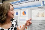 Lindsey Smith, a junior at the University of Nebraska at Kearney, shares the results of her study on club volleyball participation and its connection to collegiate scholarships Wednesday during Student Research Day at UNK. (Photo by Corbey R. Dorsey, UNK Communications)