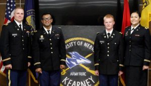 From left, ROTC cadets James Burklund, Armando Chavez, Cannon Marchand and Jeysel Olmos were commissioned as second lieutenants in the Nebraska Army National Guard during a ceremony Friday at UNK. Chavez, Marchand and Olmos also graduated from UNK that day. (Photo by Tyler Ellyson, UNK Communications)