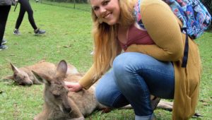 UNK junior Marissa Asche of Hebron pets a kangaroo while visiting the Australia Zoo during last month’s study abroad trip. Asche and five other Lopers spent three weeks in Australia. (Courtesy photo)