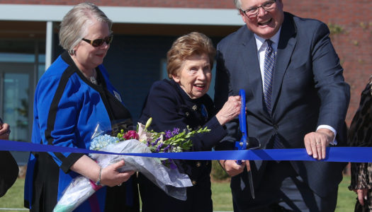 University of Nebraska at Kearney Chancellor Doug Kristensen, right, and University of Nebraska Interim President Susan Fritz, left, cut the ribbon at Tuesday’s event celebrating the completion of the new Plambeck Early Childhood Education Center. The center will open Nov. 4. (Photo by Corbey R. Dorsey, UNK Communications)